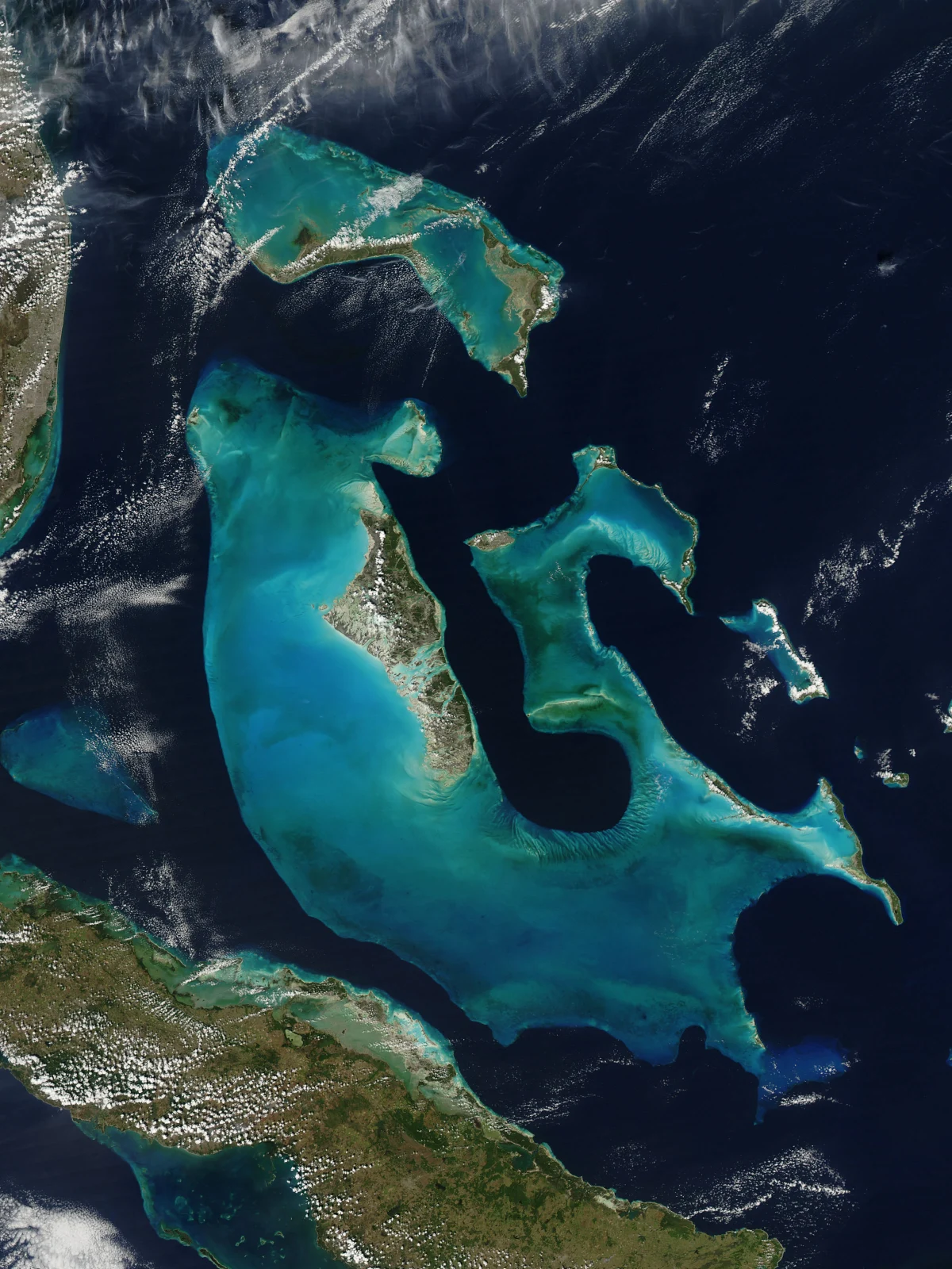 Turquoise shallows around the Bahamas meet the deep blue ocean.